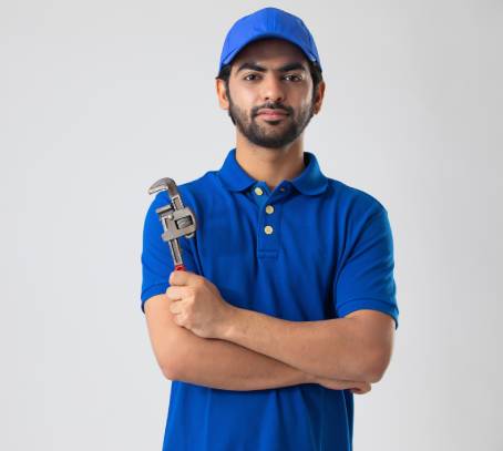 Technician standing in home kitchen
